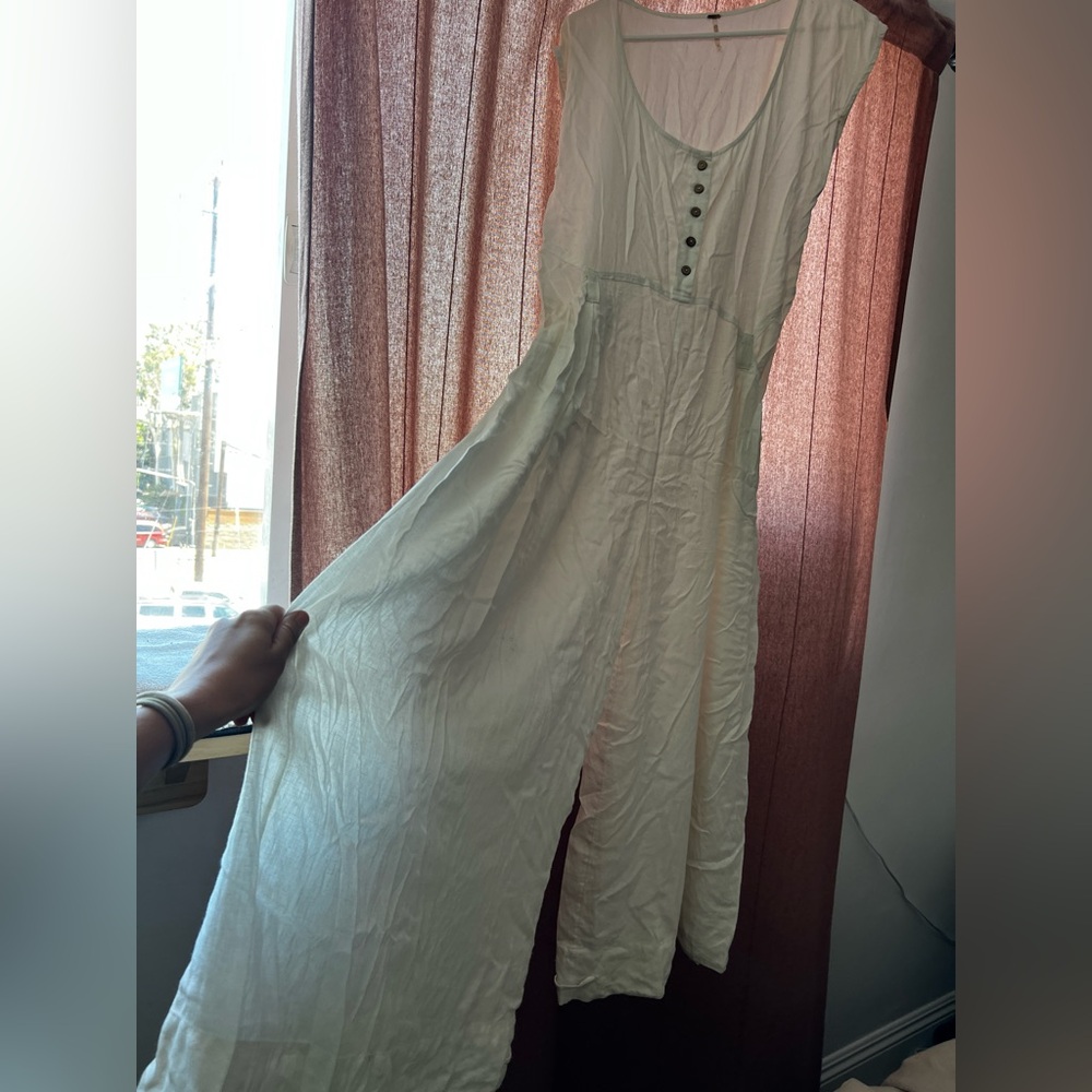 Free People white draped linen jumpsuit with button closure and drawstring pant